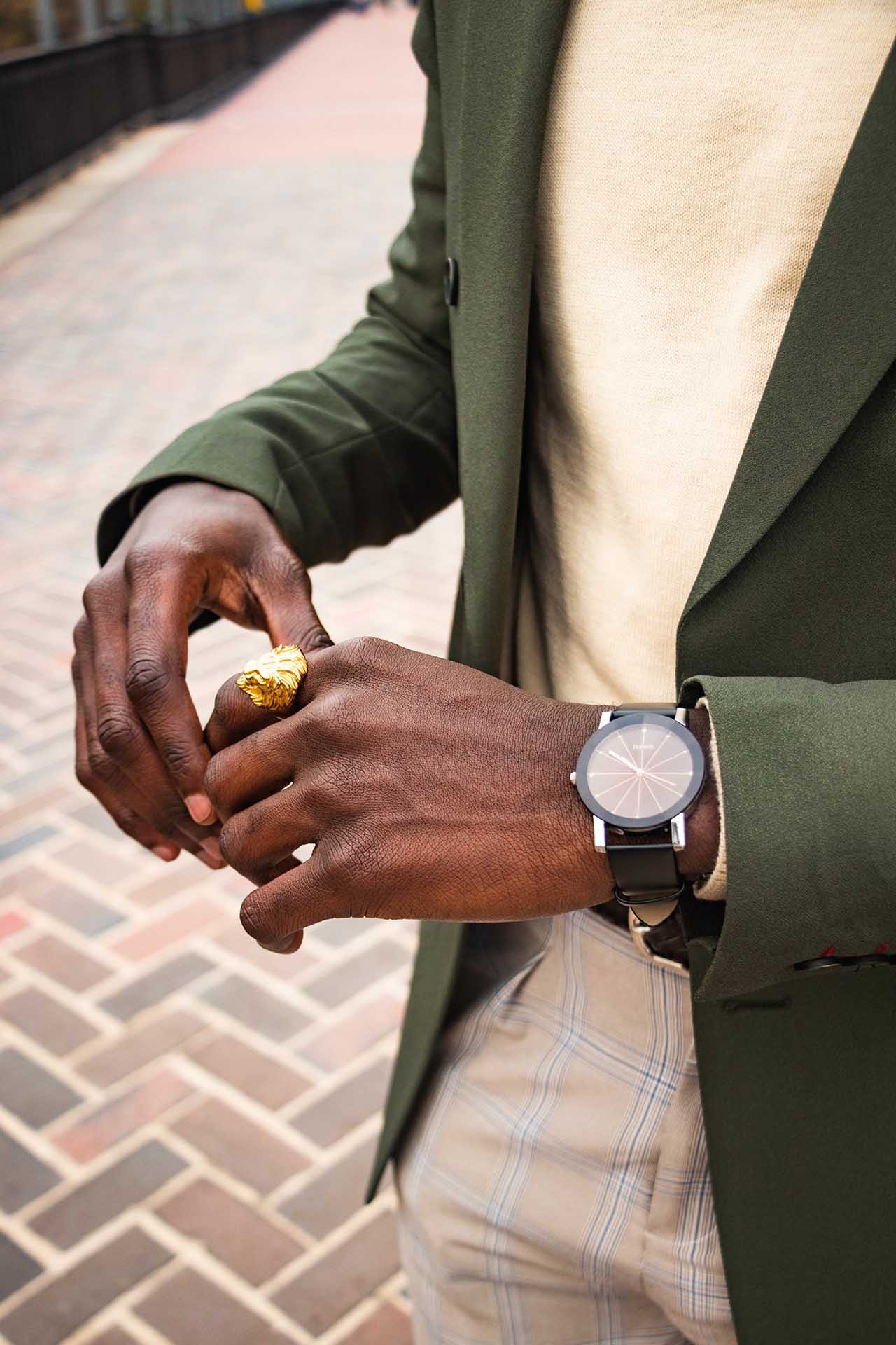 vertical-shot-of-a-modern-watch-on-a-man-s-hand-in-2023-11-27-05-13-40-utc.jpg